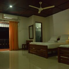 Отель Rajarata Lodge комната для гостей фото 5