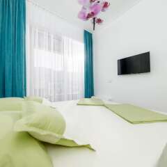 Апартаменты Luxury Harmonia Apartments комната для гостей фото 5