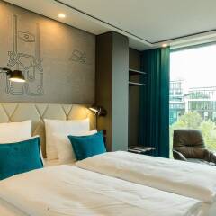 Отель Motel One München-parkstadt Schwabing Мюнхен комната для гостей фото 2