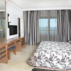 Отель Palm Beach Hotel & Bungalows Кипр, Ларнака - 1 отзыв об отеле, цены и фото номеров - забронировать отель Palm Beach Hotel & Bungalows онлайн комната для гостей фото 4