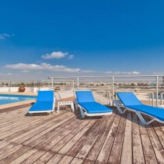 Апартаменты El Lago Apartments бассейн