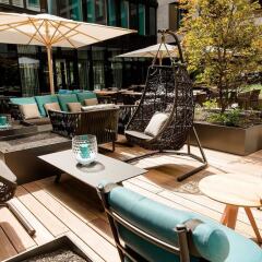 Отель Motel One München-parkstadt Schwabing Мюнхен бассейн фото 3
