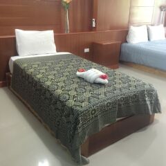 Апартаменты Poonsap Apartment Ланта комната для гостей фото 2