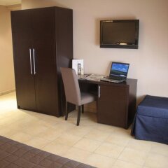 Отель Seven Kings Relais удобства в номере