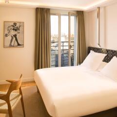 Hotel Marignan Champs-Elysées комната для гостей