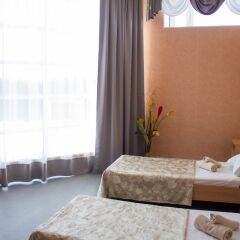 Hotel Kurgan Петрозаводск комната для гостей фото 5
