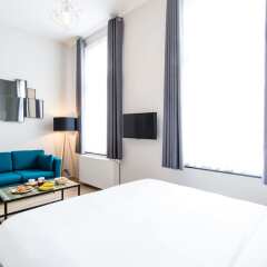 Отель Urban Suites Brussels Schuman Бельгия, Брюссель - отзывы, цены и фото номеров - забронировать отель Urban Suites Brussels Schuman онлайн комната для гостей фото 2