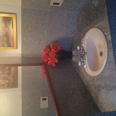 Отель New Rome Motel удобства в номере