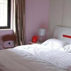 Отель Gulangyu Lianhe Apartment Hotel - Xiamen Китай, Сямынь - отзывы, цены и фото номеров - забронировать отель Gulangyu Lianhe Apartment Hotel - Xiamen онлайн комната для гостей фото 2