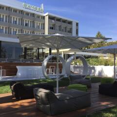Отель Oxygen Lifestyle Hotel Helvetia Parco Италия, Римини - 5 отзывов об отеле, цены и фото номеров - забронировать отель Oxygen Lifestyle Hotel Helvetia Parco онлайн гостиничный бар