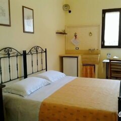 Отель B&B Li Ccoti Италия, Канноле - отзывы, цены и фото номеров - забронировать отель B&B Li Ccoti онлайн комната для гостей фото 3