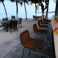 Отель Cocoplum Beach Колумбия, Сан-Луис - 1 отзыв об отеле, цены и фото номеров - забронировать отель Cocoplum Beach онлайн гостиничный бар