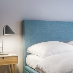 Отель UNIC Apartments Dominikanska Польша, Познань - отзывы, цены и фото номеров - забронировать отель UNIC Apartments Dominikanska онлайн комната для гостей фото 2