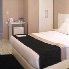 KremoN Hotel Усак комната для гостей фото 4