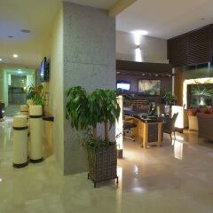 Отель Sunset Plaza Beach Resort & Spa интерьер отеля