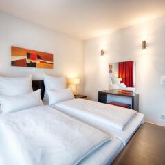 Leonardo Hotel München City West комната для гостей