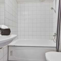Апартаменты Forenom Serviced Apartments Oslo Rosenborg ванная фото 2