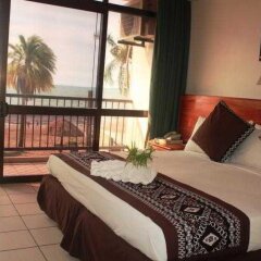Smugglers Cove Beach Resort and Hotel комната для гостей фото 5