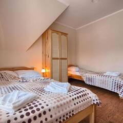 Апартаменты Visitzakopane City Apartments Закопане комната для гостей фото 2