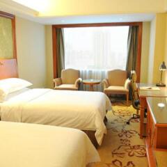Vienna International Hotel (Guangzhou Science City Performance Center) комната для гостей