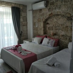 Отель Alacati Asmali Konak Otel Чешме комната для гостей фото 5