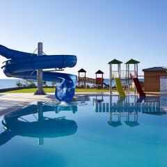 Отель Mitsis Alila Exclusive Resort and Spa бассейн