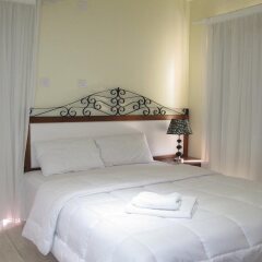 Апартаменты El Lago Apartments комната для гостей