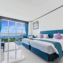 Отель Andaman Beach Suites Пхукет комната для гостей фото 5