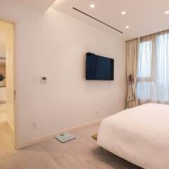 Отель M Suites by S Home Хошимин фото 8