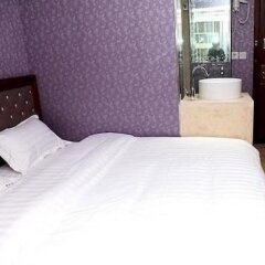 Xinyijia City Hotel комната для гостей