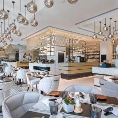 Отель Al Bandar Rotana питание фото 2