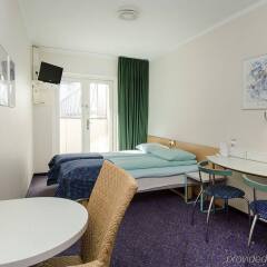 Отель Cabinn Aarhus Hotel Дания, Орхус - 2 отзыва об отеле, цены и фото номеров - забронировать отель Cabinn Aarhus Hotel онлайн комната для гостей фото 4