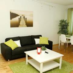 Апартаменты Kotimaailma Apartments Joensuu Йоенсуу комната для гостей фото 3