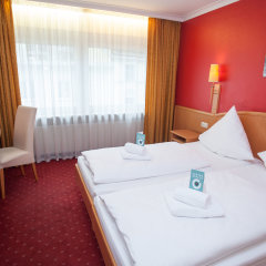 Отель Centro Hotel Mondial Германия, Мюнхен - 7 отзывов об отеле, цены и фото номеров - забронировать отель Centro Hotel Mondial онлайн комната для гостей фото 4