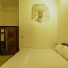 Отель Tigon Homestay сейф в номере