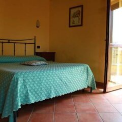 Отель Poggio Del Sole Country House Италия, Ситта-Сант-Анджело - отзывы, цены и фото номеров - забронировать отель Poggio Del Sole Country House онлайн комната для гостей фото 3