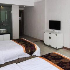 Апартаменты Yelinyuan Holiday Apartments удобства в номере