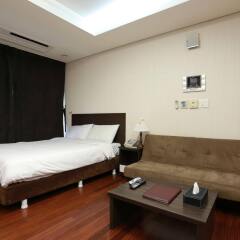 Отель Brown Suites Seoul Южная Корея, Сеул - 1 отзыв об отеле, цены и фото номеров - забронировать отель Brown Suites Seoul онлайн комната для гостей фото 2