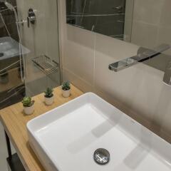 Апартаменты Lovely apartment close to Acropolis by GHH Афины ванная фото 2