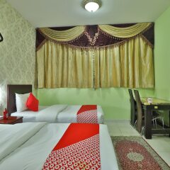 OYO 261 Remas Hotel Apartment Дубай комната для гостей фото 3