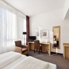 Отель ACHAT Premium Hotel München Süd Германия, Мюнхен - 1 отзыв об отеле, цены и фото номеров - забронировать отель ACHAT Premium Hotel München Süd онлайн удобства в номере фото 2