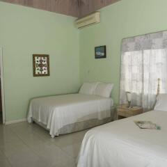 Отель Celebrity Villa Jamaica Ямайка, Монтего-Бей - отзывы, цены и фото номеров - забронировать отель Celebrity Villa Jamaica онлайн комната для гостей