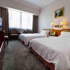 Отель The Overseas Chinese Building Hotel Китай, Шэньчжэнь - отзывы, цены и фото номеров - забронировать отель The Overseas Chinese Building Hotel онлайн комната для гостей фото 2