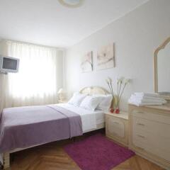 Апартаменты Yakub Kolas Square Apartments Минск комната для гостей фото 3