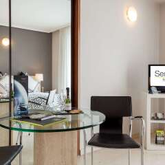 Отель Apartamentos Sercotel Togumar удобства в номере фото 2