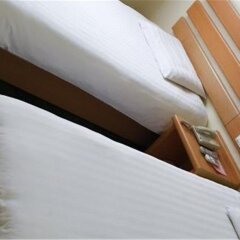 Отель Home Inn Chongqing Wanzhou Shixian Road удобства в номере