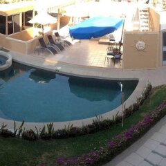 Отель Cabo Sunset Condo Hotel Мексика, Педрегал - отзывы, цены и фото номеров - забронировать отель Cabo Sunset Condo Hotel онлайн бассейн