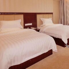 Отель Jinxing Holiday Hotel - Zhongshan Китай, Чжуншань - отзывы, цены и фото номеров - забронировать отель Jinxing Holiday Hotel - Zhongshan онлайн комната для гостей фото 2