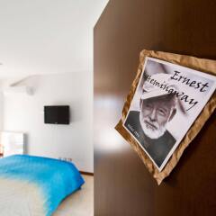 Отель Bed And Breakfast Letterario Фьюмичино сейф в номере