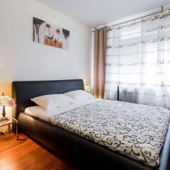 Апартаменты Downtown Apartments Bane комната для гостей